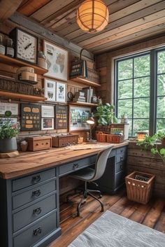 a home office with lots of shelves and plants on the desk in front of a large window