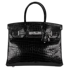 Hermès Black Shiny Porosus Crocodile Leather Birkin 30cm Retourne Brand- Hermès Model- Birkin 30cm Product Type- Tote Serial Number- * Age- Circa 2016 Accompanied By- Hermès Dust Bag, Lock, Keys, Clochette, Spa Receipt Colour- Black Hardware- Palladium Material(s)- Porosus Crocodile Leather Height- 25cm Width- 30cm Depth- 16cm Handle Drop- 10cm Interior- Black Leather Closure- Turn Lock, Padlock Country of Origin- France CITES/Export Restrictions- Please note, this item may be subject to CITES r Black Bag Aesthetic, Black Hermes Birkin, Black Birkin Bag, Birkin Crocodile, Hermes Crocodile Bag, Birken Bag, Black Birkin, Hermes Tote Bag, Birkin Bags