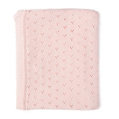 a pink blanket with small holes on the front and bottom, folded up in half