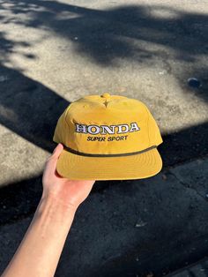 Vintage Inspired Honda Super Sport Snap Back The hat is made of 100% polyester. Extremely breathable and very comfortable. Strap-back adjustable - Adjustable size fits most. This hat has a high crown profile, and a slightly curved bill. The embroidery consists of high-quality high shine polyester threading for longevity and durability. Hats are made to order :) Sport Snap, Vintage Trucker Hats, Snap Back, Super Sport, Snap Backs, Product Ideas, Trucker Hats, Trucker Cap, Caps Hats