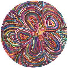 a colorful circular rug with an abstract design on the center and bottom, in multicolors