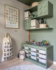 a child's playroom with legos on the shelves and toys in bins