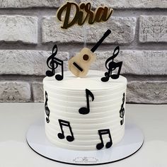 a white cake with musical notes on it