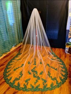 a wedding veil is sitting on the floor