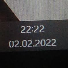 a close up of a clock with the date 22 02 2012 on it's side