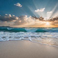 the sun is shining through clouds over the ocean