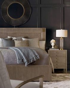 a bedroom with black walls and white carpet