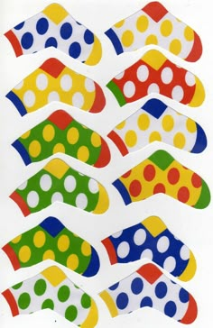 colorful polka dot stickers on white background