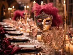 a masquerade mask sitting on top of a long table covered in plates and glasses