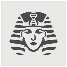 an egyptian mask with the head of pharaoh tutane in black on a gray background