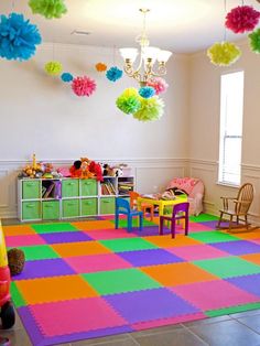 a brightly colored play room with toys and decorations