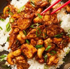 chicken and cashews with white rice in a bowl