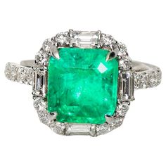 ** GRS 18K 4.37 Ct Colombia Emerald&Diamonds Engagement Ring ** GRS-Certified natural Colombia emerald with great color and fire luster weighing 4.37 ct set on the 18K white gold pave' band with FG VS baguette and round diamond weighing 1.28 ct. The beautiful Colombia emerald with great design makes the ring very attractive and can be worn on any important occasion and daily wearing. Emerald is a green-colored, highly precious stone of the Beryl mineral family. It is one of the most reputed gemstones in astrology and is worn for success in businesses & jobs, creative or intellectual pursuits, and knowledge-seeking ventures. Main Stone Variety: Natural Emerald Shape: Emerald Cut Weight: 4.37 Carat Color: Green Origin: Colombia Side Stone Variety: Natural Diamond Shape: Baguette / Round Bril Antique Emerald Engagement Ring, Vintage Cluster Ring, Emerald Set, Wedding Ring For Her, Platinum Diamond Engagement Rings, Platinum Diamond Rings, White Gold Set