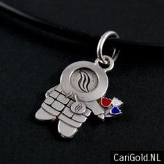 a silver charm with an image of a hand holding a flag on it's side