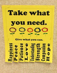 a yellow sticker that says, take what you need give what you can