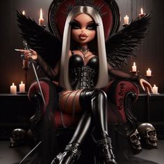 a doll sitting on top of a red chair with candles in the background and a candle lit room behind her