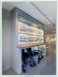 a pharmacy store with two wheelchairs in front of the counter and shelves on the wall