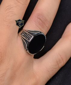 "Handmade Turkish Silver Ring, Men's Black Onyx Silver Ring, 925 Sterling Silver Ring, Classic Ring, birthday gift, dad gift ✦ Details ✦ * Material: 925 Sterling Silver * Gemstone: Onyx * Weight: 8.00 grams * The size of the stone: 15x20 mm. * Sides oxidized, decorated with Garnet stones and Micro Zircon stones. * Stamp: 925 * Available sizes; 5 US to 16 US. Contact me if you need any other size! ✦ Shipping ✦ * Processing time: 1-3 business days. * This item ships from my Turkish workshop in Istanbul. * Add your phone number in address box for a smoother delivery. That makes courier personnel's job easier.  ✦ Packaging ✦ * Comes with a luxury gift box and a jewellery cleaning cloth. ✦ Returns, Exchanges ✦ * Return option available for 30 days after the delivery. * The product has to be in Elegant Black Jewelry For Father's Day, Black Sterling Silver Jewelry For Father's Day, Black Sterling Silver Signet Ring For Anniversary, Black Signet Ring With Polished Finish Gift, Father's Day Black Engraved Jewelry, Engraved Black Rings For Gift, Black Sterling Silver Signet Ring For Gift, Iranian Rings For Men, Luxury Gothic Men's Sterling Silver Ring