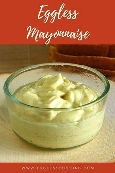 an eggless mayonnaise in a glass bowl with toasted bread on the side