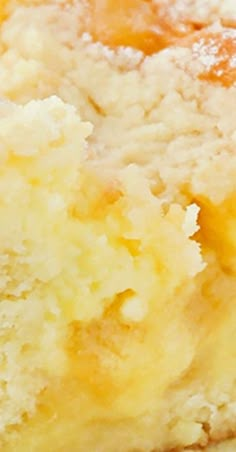 a close up view of a piece of cake on a plate with powdered sugar