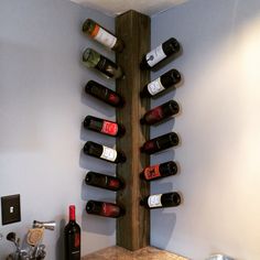 a wine rack with many bottles on it