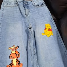 Take A Trip To The Hundred Acre Woods With These Hot Topic Winnie The Pooh Jeans, Item Comes From A Smoke Free Home. Winnie The Pooh Converse, Painted Disney Jeans, Winnie The Pooh Items, Winnie The Pooh Outfit For Women, Alyssa Core Aesthetic, Cute Baggy Pants, Winnie The Pooh Clothes, Senior Painted Jeans, Disney Sublimation