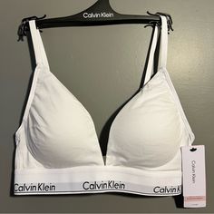 Brand New, White, Lightly Lined Bralette. Iconic Thick Elastic Band With Convertible Adjustable Straps. Calvin Klein Bralette, White Calvin Klein, Womens Calvin Klein, Elastic Band, Women's Intimates, Bralette, Convertible, Adjustable Straps, Calvin Klein