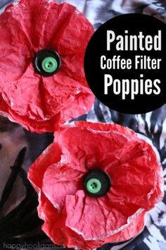 two red poppies with green eyes on them sitting next to each other and the words painted coffee filter poppies