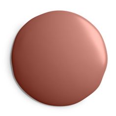 a close up view of the top of a round, matte pink paint bottle