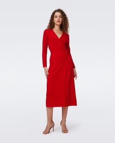 Crafted from a soft cashmere-wool blend, the Astrid midi dress has a cozy feel. This true wrap dress has long sleeves, a V-neckline, and ties at the waist. A bestseller year after year, this piece has a simple, polished look that can be dressed up or down.Yana is 5 Foot and 8 Inches and wearing a size XS. Formal Fall V-neck Wrap Dress, Winter Cashmere Midi Dress, Elegant Cashmere Dresses For Fall, Chic Cashmere Fall Dress, Chic Cashmere Dress For Fall, Chic Cashmere Midi Dress, Winter V-neck Midi Dress For Workwear, Elegant Winter V-neck Midi Dress, Elegant Long Sleeve Wrap Dress For Winter