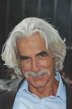 an older man with white hair and a moustache