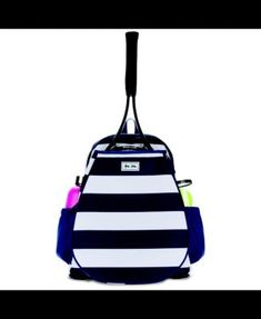 a back pack with a tennis racket hanging from it