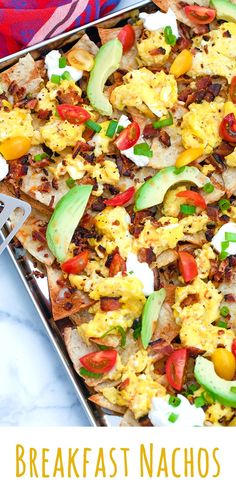 this breakfast nachos recipe is loaded with eggs, bacon, avocado and tomatoes