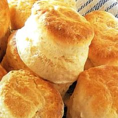 a pile of biscuits sitting on top of a blue and white towel