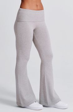 The Portia Knit Pants are a must-have for any wardrobe. These versatile pants feature a flattering fit and flare silhouette, with a wide rib waistband for added style. Complete the look with the matching Portia knit hoodie.     Colour: Light Grey Marl.  Regular length.  Unlined.  Fit and flare silhouette.  Wide 2x2 rib waistband.  Fold over waistband detail.  Internal elastic in waistband.  Model is an XS and is wearing an XS.   Size: XS, S, M, L, XL, XXL Grey Knitwear Outfits, Ribbed Set, Knit Flare Pants, Grey Flare Sweatpants, Uni Glo Grey Wideleg Lounge Pants, Low Rise Knit Pants, Pretty Little Thing, Ribbed Knit Wide-leg Bottoms, Homecoming Dresses Corset