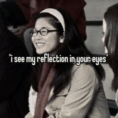 a woman wearing glasses and a scarf with the words i see my reflection in your eyes