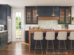 a kitchen with wooden floors and dark blue cabinetry, along with bar stools