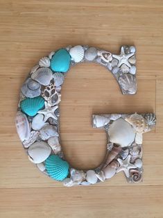 the letter c is made out of seashells