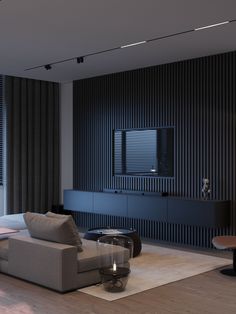 a modern living room with black and white striped walls