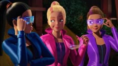 three animated women wearing purple and blue clothing