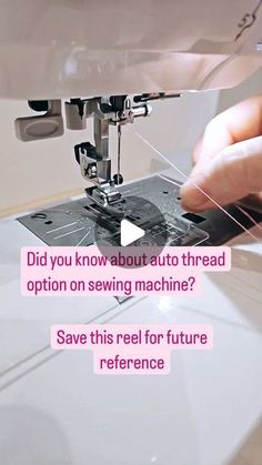 someone is using a sewing machine to sew something on the table with words below it