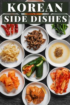 the korean side dishes are arranged on white plates