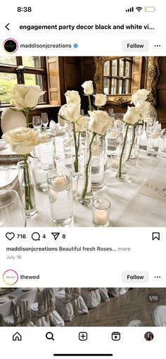 the table is set with white flowers and candles