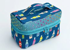 a blue lunch bag with various items all over it and on the inside, there is a zippered closure