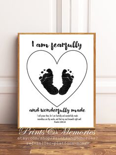 a poster with the words i am fearlessly and an image of a baby's footprints