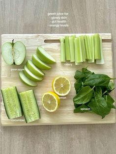 a cutting board topped with sliced up vegetables