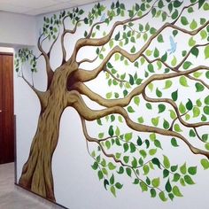 a tree painted on the wall in an office