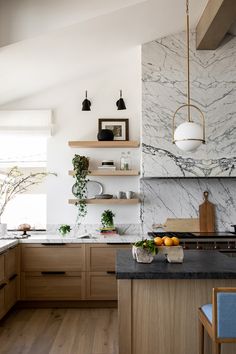 the kitchen is clean and ready for us to use it's marble counter tops