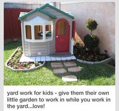 a small house with a red door in the grass next to a brick walkway and potted plant