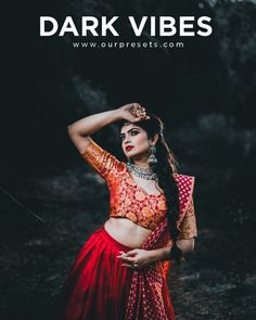 a woman in a red and gold lehenga with the words dark vibes